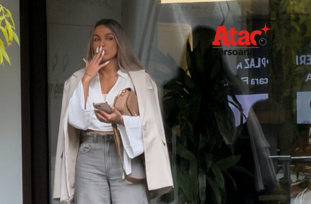 Paparazzi || Ella Vișan, de la „Insula Iubirii” în așteptarea unui Uber în Primăverii! Fosta concurentă, cu telefonul fierbinte și țigara aprinsă